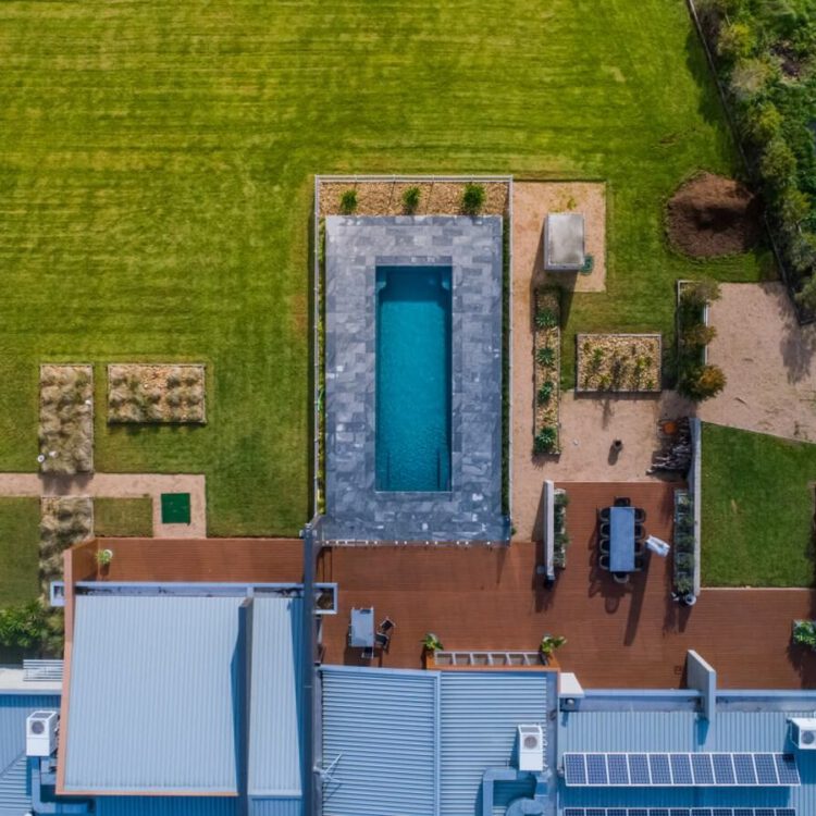 Compass Pools Australia Beautifully Landscaped Backyard With X Trainer Pool As Its Centrepiece