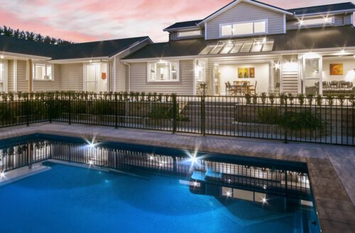 Compass Pools Australia X Trainer Bi Luminite Pool With Lights On By Sunset