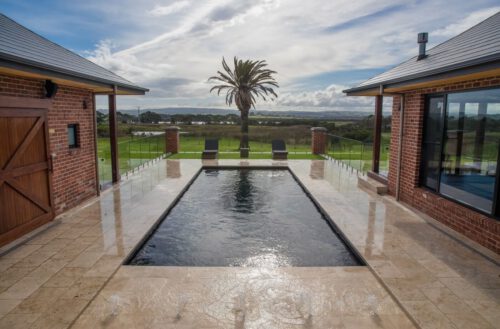 Compass Pools Australia X Trainer Fibreglass Pool With Sunpod Water Feature