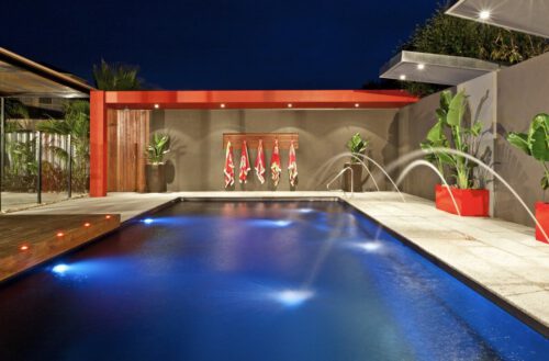 Compass Pools Australia X Trainer Swimming Pool With Deck Jets And Lights On In Point Cook Near Werribee Victoria